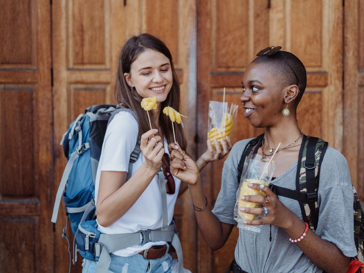 friends backpackers laughing